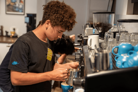Training with TRACTION - Merlo Coffee
