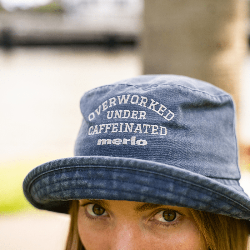 'Overworked Under Caffeinated' Washed Navy Denim Bucket Hat