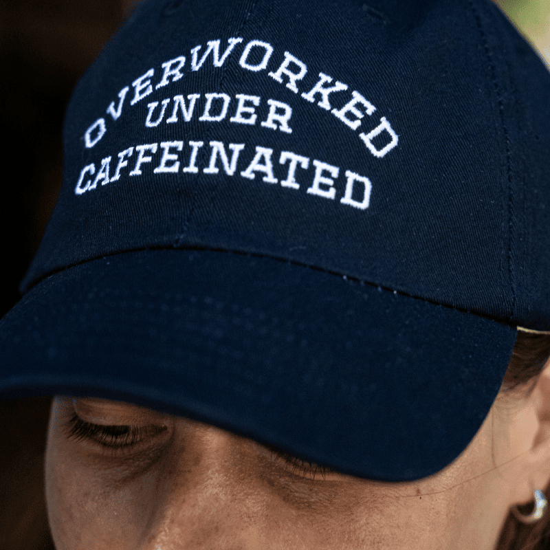 'Overworked Undercaffeinated' Dad Cap Navy